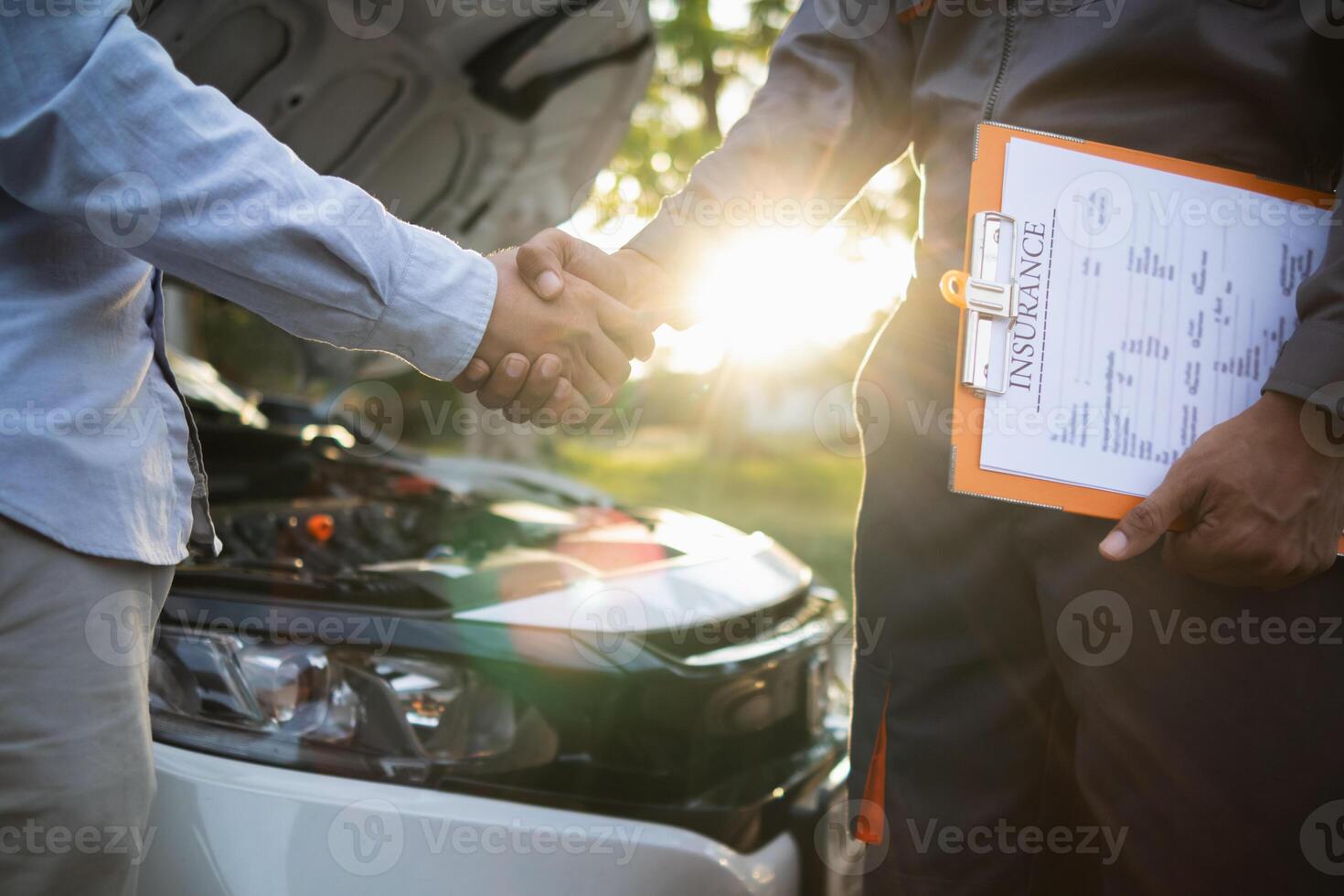 Technicians from service center inspect and assist customers cars that are having problems while traveling build confidence in customers who choose buy car from service center and receive help quickly photo