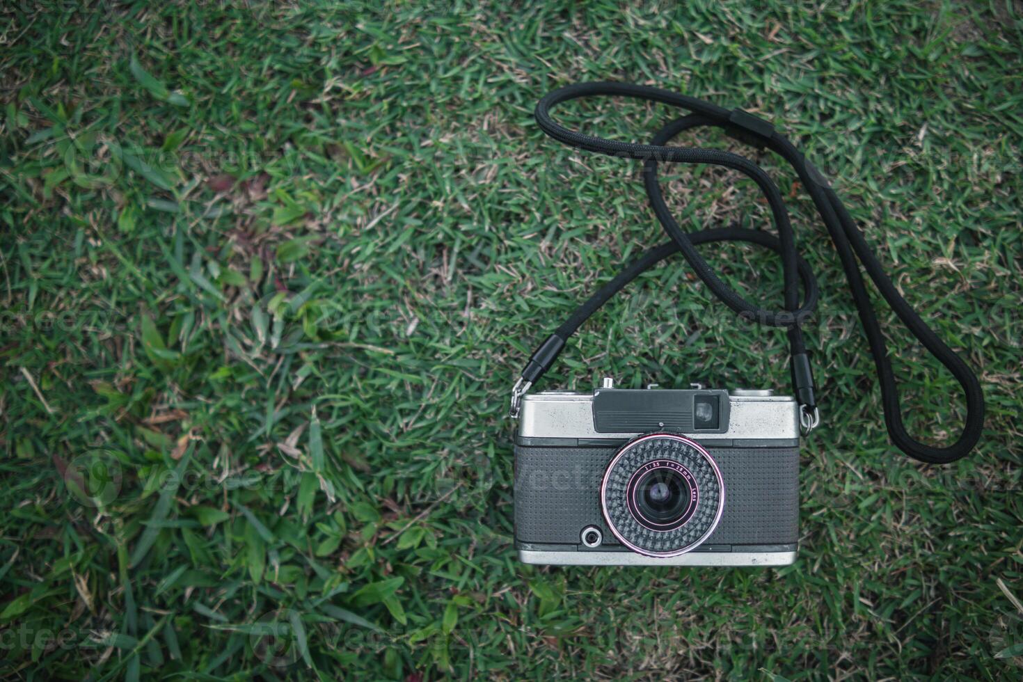 Vintage style film cameras are back in use today because film cameras are classic and have a beautiful shape that gives image unique tone causing some photographers to turn to film cameras. Copy Space photo