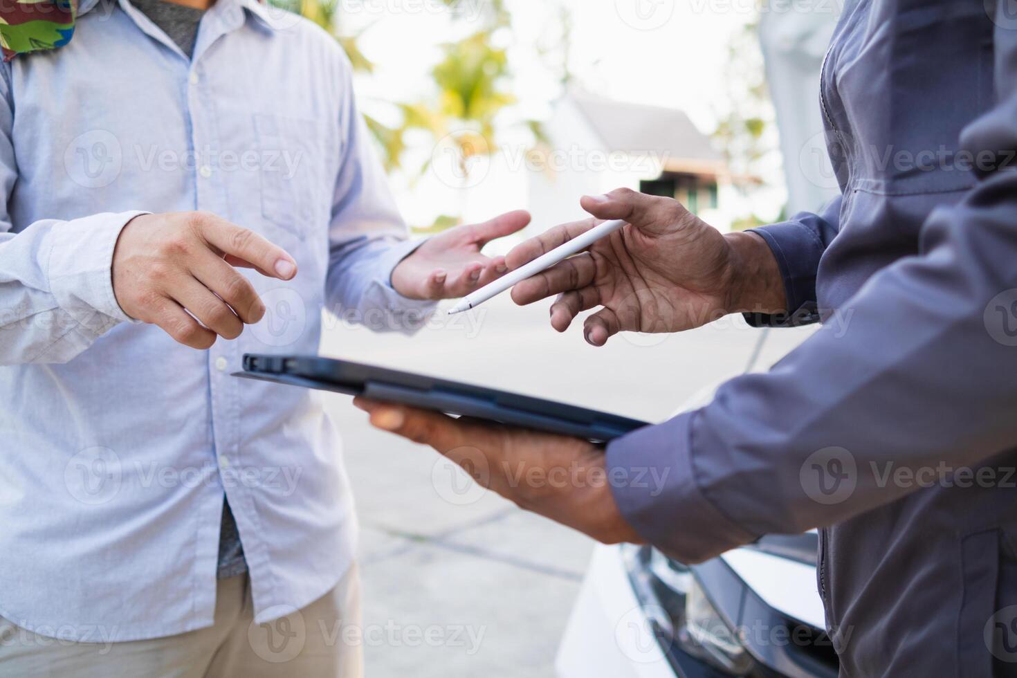 Technicians from service center inspect and assist customers cars that are having problems while traveling build confidence in customers who choose buy car from service center and receive help quickly photo