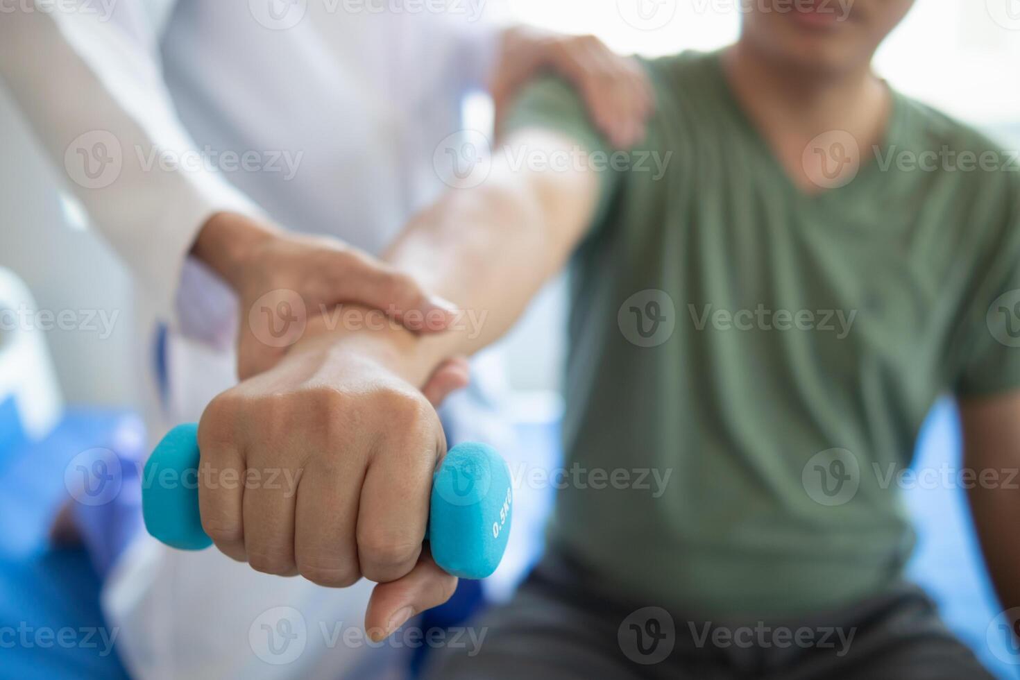 man was admitted for treatment of muscle pain in back of his shoulder due to working hard and causing muscle inflammation. doctor is treating man muscle pain in his back and shoulders due to overwork. photo