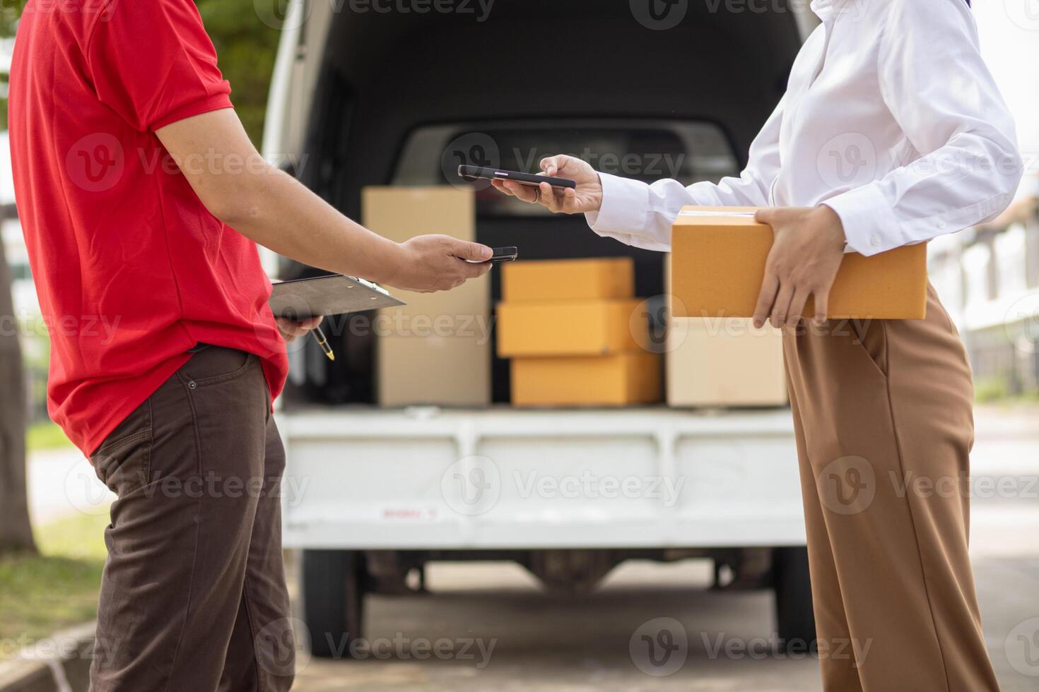 SME business operator is inspecting and packing products into parcel box for delivery company that will come pick up products after participating in online marketing with Application shopping online photo