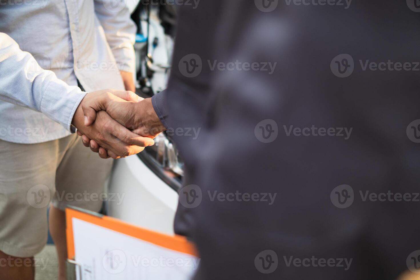 Technicians from service center inspect and assist customers cars that are having problems while traveling build confidence in customers who choose buy car from service center and receive help quickly photo