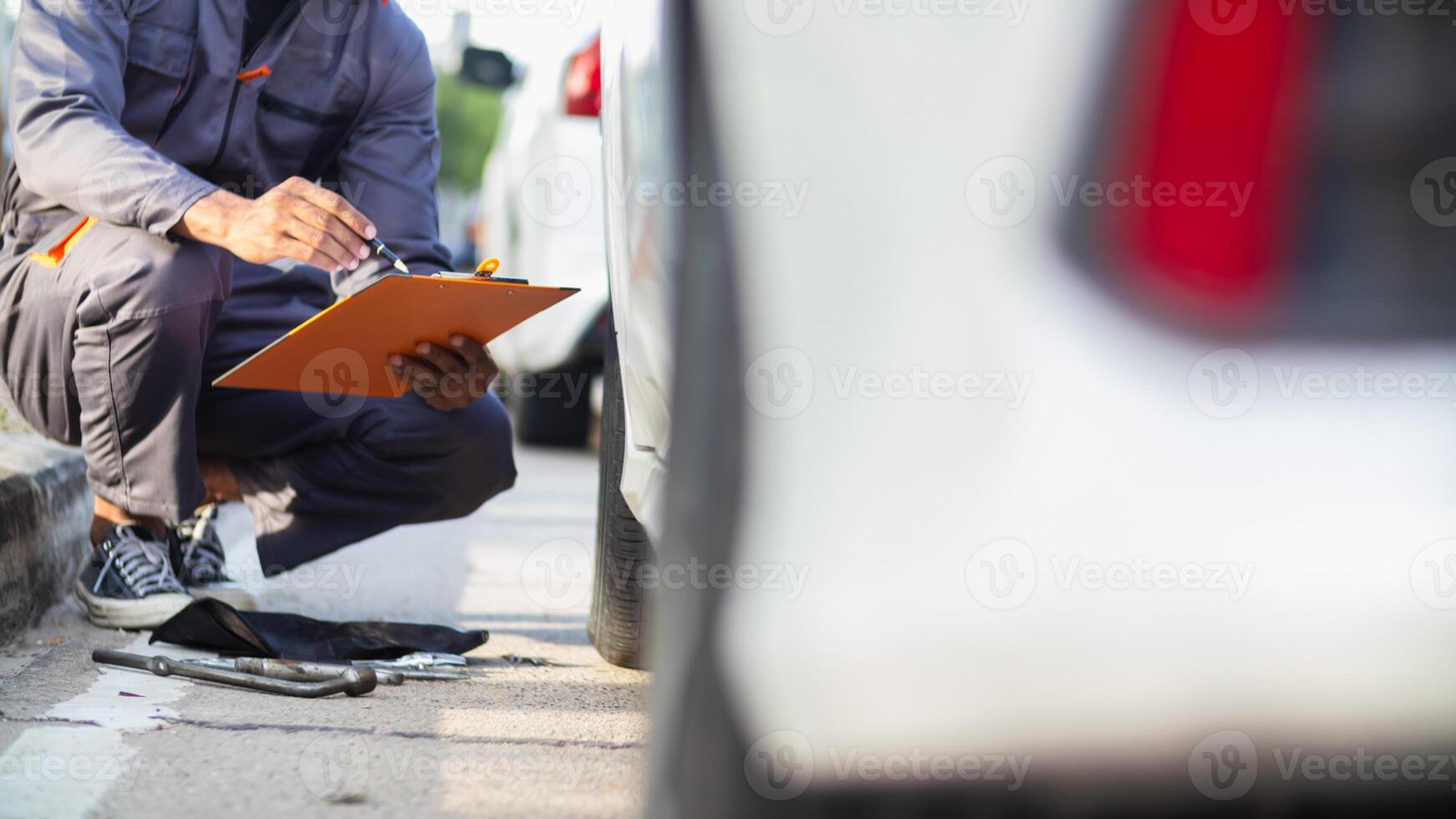 car service center mechanics are checking condition car and engine make sure they are ready use and in perfect condition according center warranty. periodic vehicle inspections for safety in driving. photo