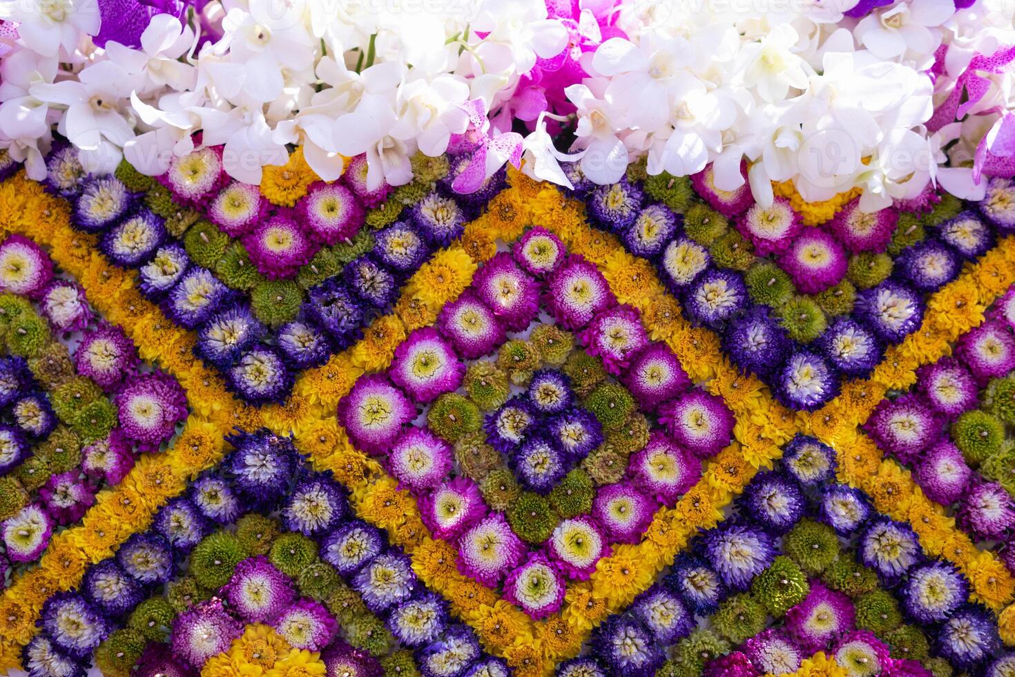 backdrop of beautifully arranged flower and bright colors is backdrop for flower in beautifully arranged garden at flower festival. Beautiful colorful background with Copy Space for inserting text. photo