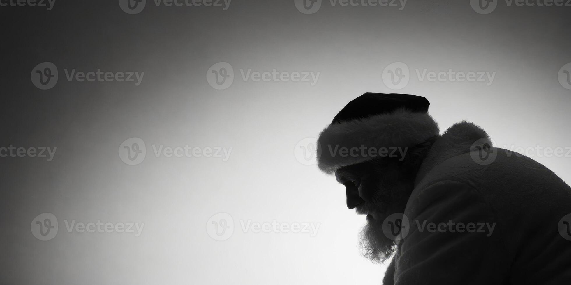 A garish Santa sits with a blank stare. On a white empty background. photo