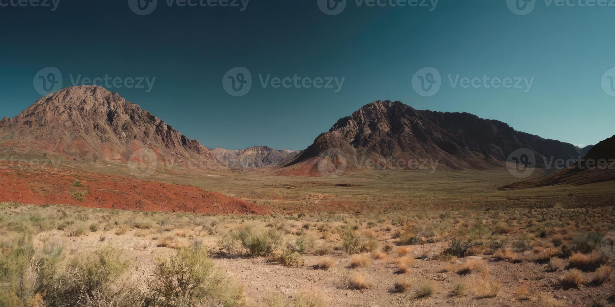Deserted hills transition to mountains. Landscape of vegetation and mountains. photo