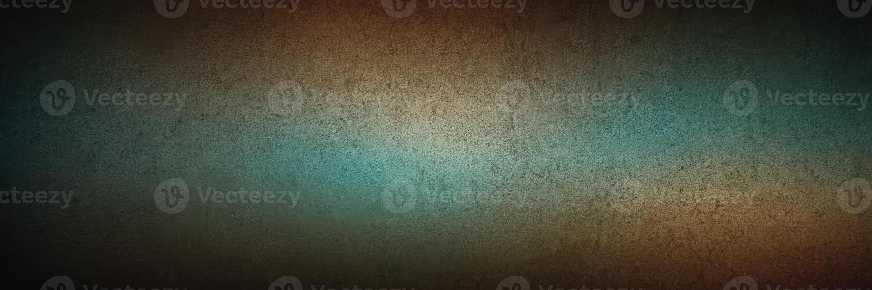 A concrete wall, shabby, old, with glints of light. Background wall with blue and orange light. Slight Vignetting. photo