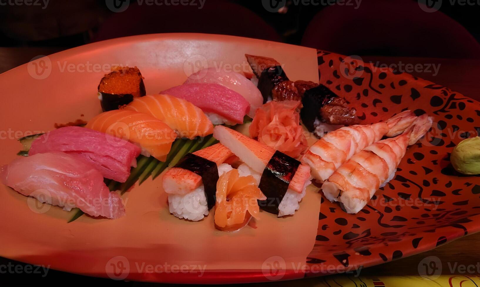 a plate of sushi with different types of fish photo