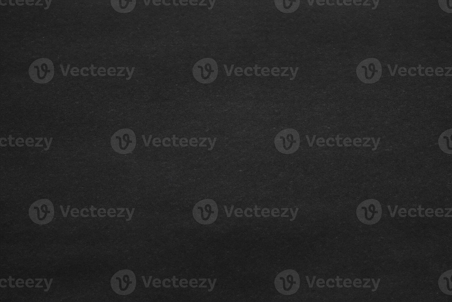 Dark Paper Texture with Spotlight on Dark Wall Background photo