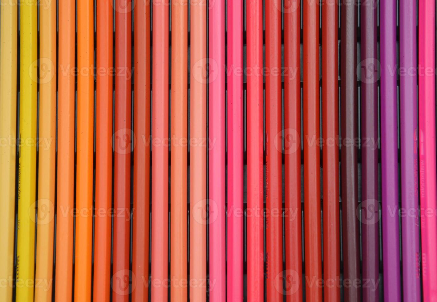 Set of colored pencils lying vertically. Nice gradient. Abstract beautiful background. photo