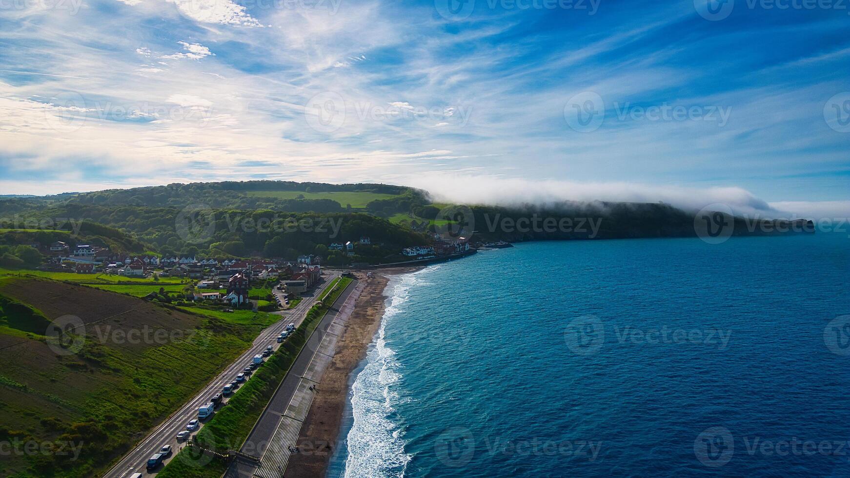 Aerial view of coastal landscape with road and misty horizon in Sandsend, Yorkshire photo