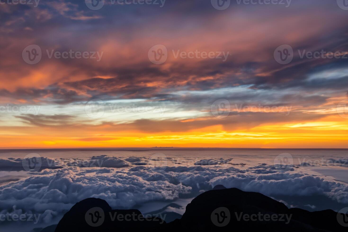 Beautiful Clouds Over the Mountains Create a Harmonious Atmosphere, Painting a Serene and Majestic Scene of Natural Beauty photo