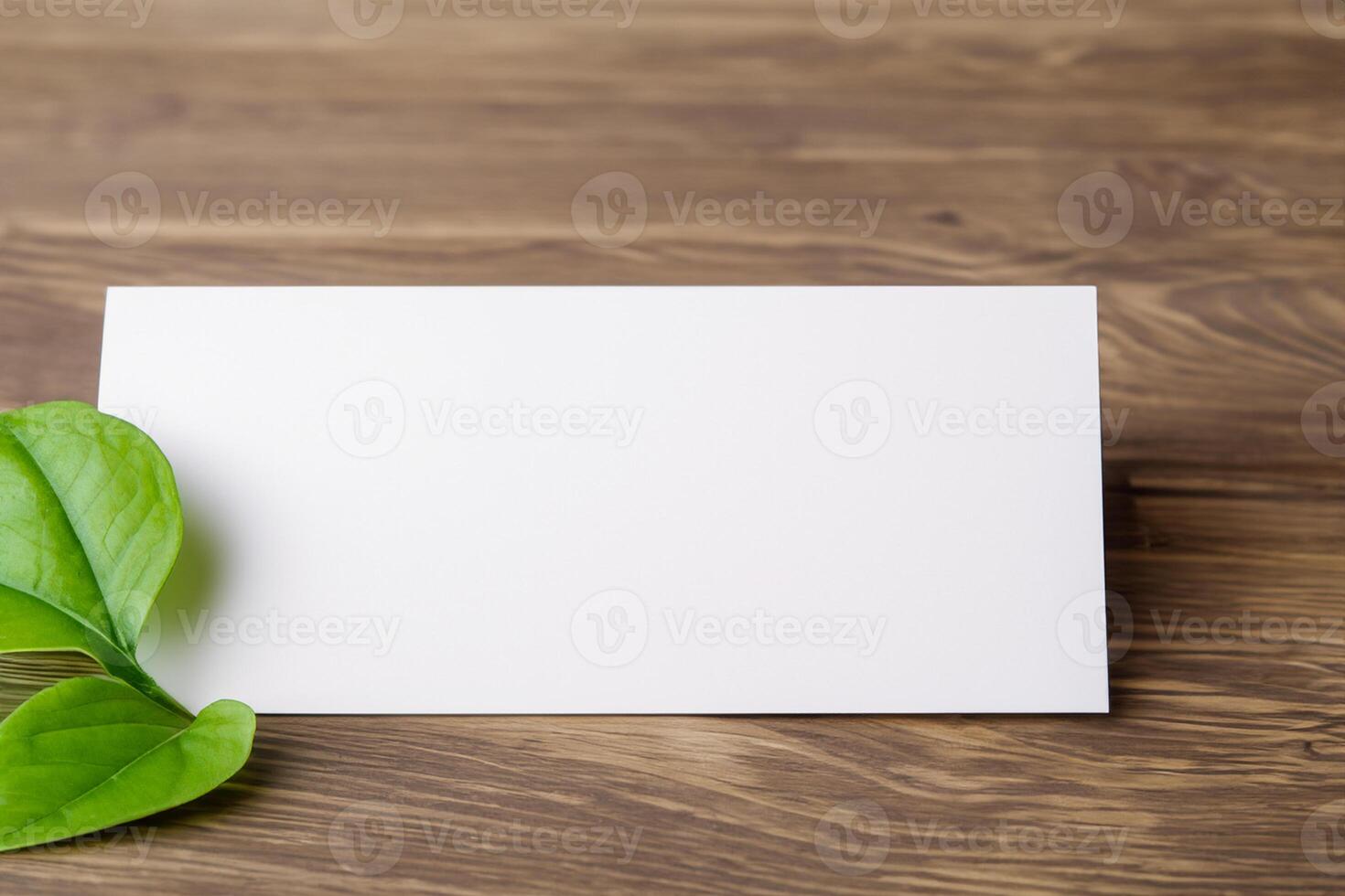 Beautiful Mockup Paper on Wooden Background Combined with Leaves, Creating a Charming and Natural Setting for Creative Designs and Artistic Presentations photo