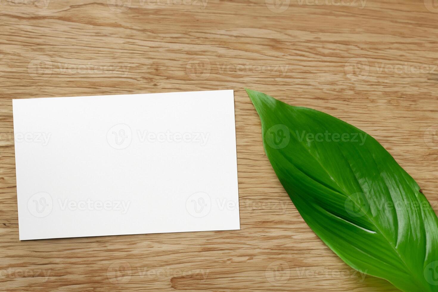 Wooden Background Combined with Leaves Enhances the Elegance of Paper, Creating a Stunning Composition Inspired by Nature's Harmony photo