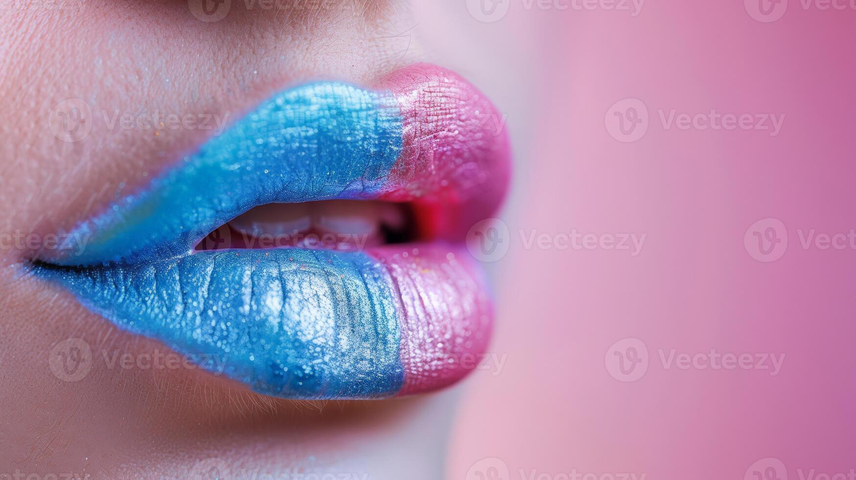 Close up of vibrant blue and pink glitter lipstick on womans lips, concept for fashion, makeup, and LGBTQ Pride events photo