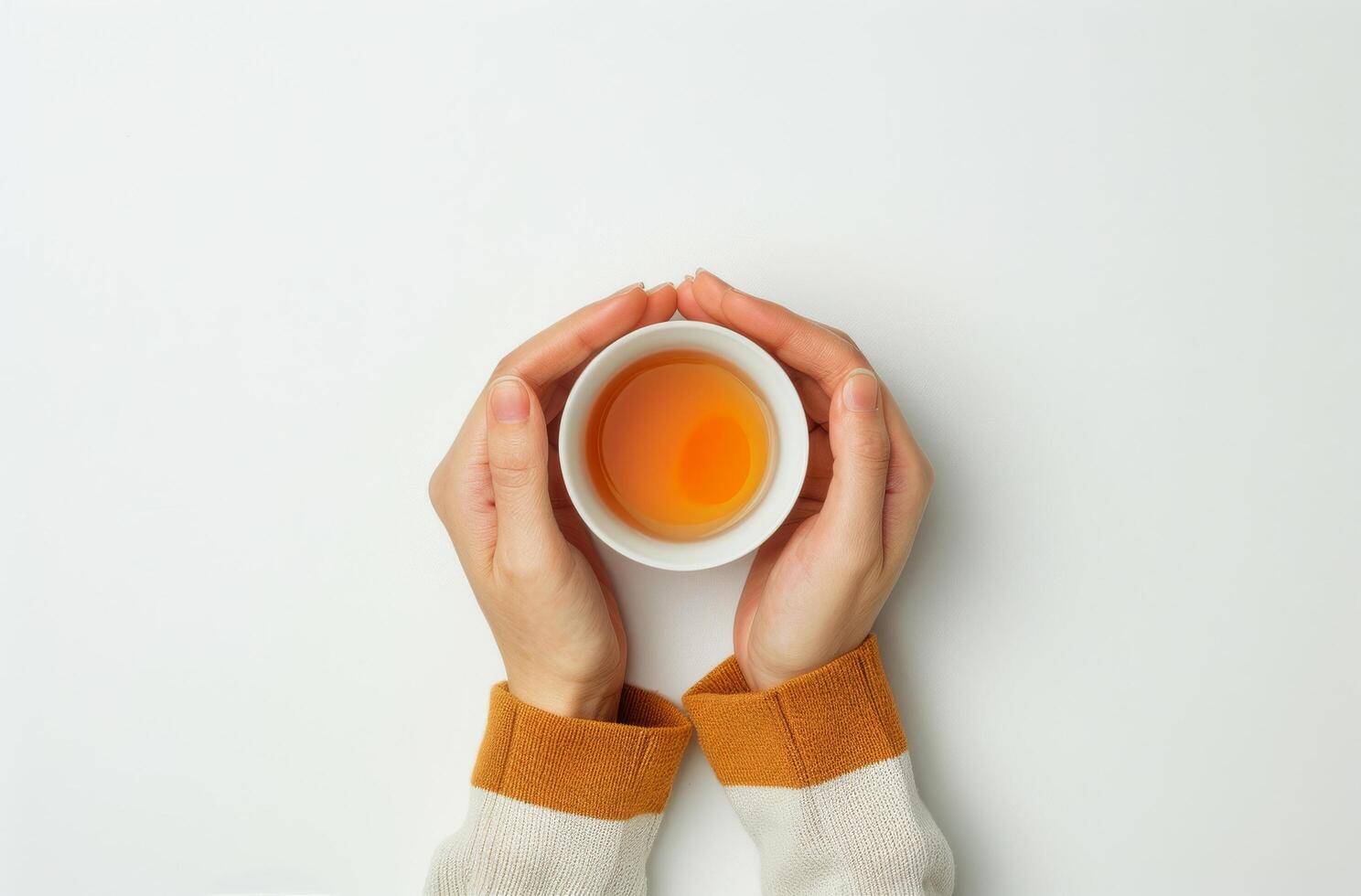Person Holding Cup of Tea photo