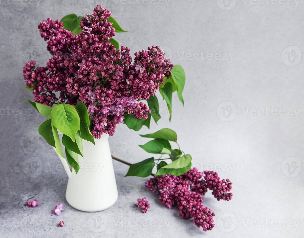 Lilac flowers on a vase photo