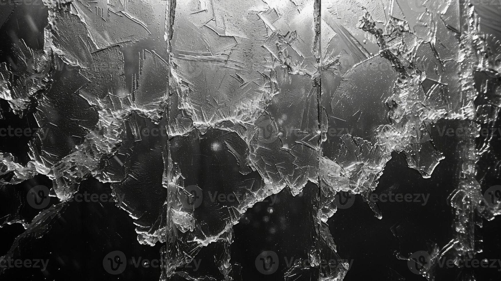 Texture of icy patterns on a window Intricate weblike designs stretch across the gl created by the frozen condensation of breath and adding a delicate frosty touch to th photo