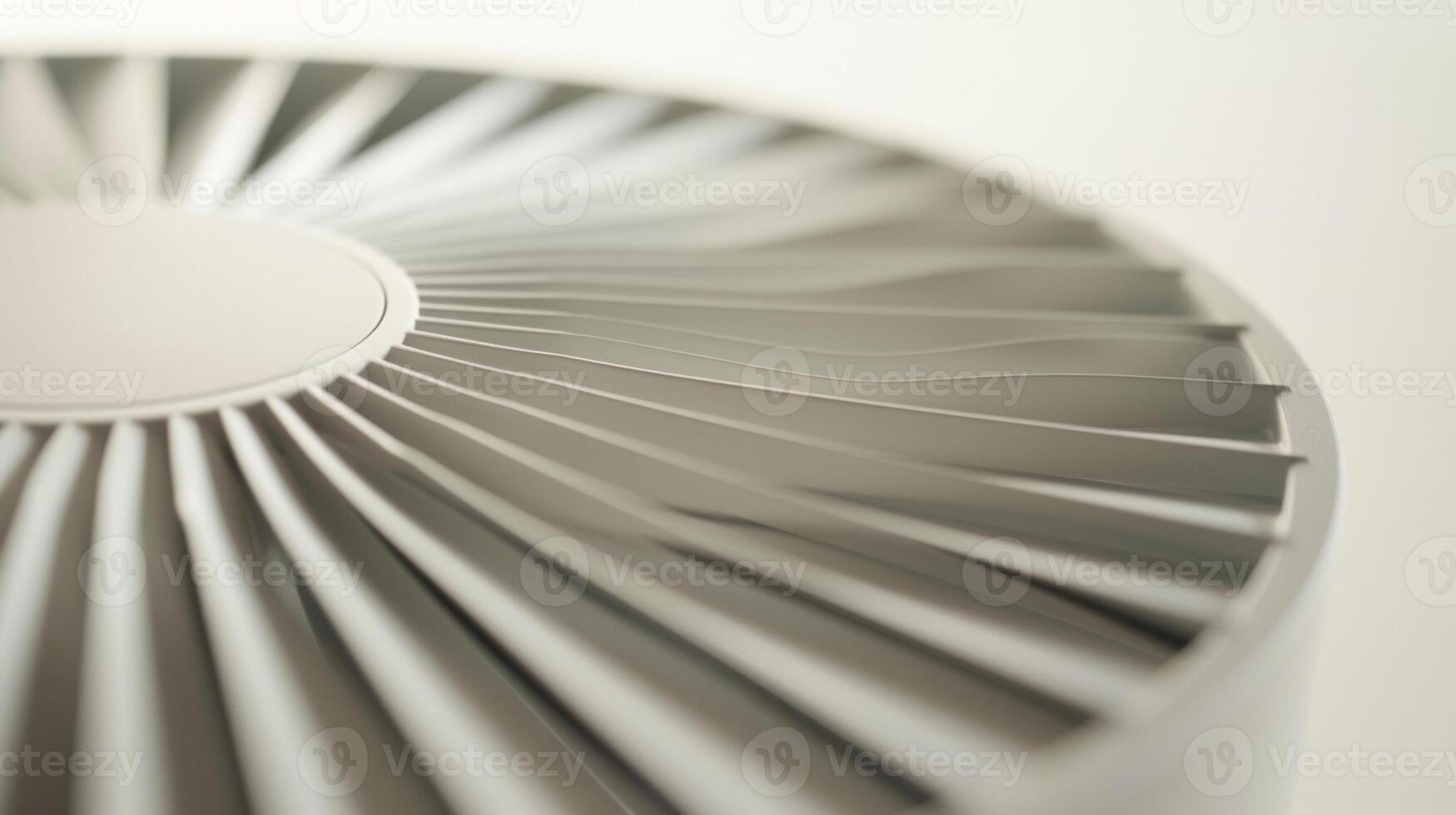 A detailed shot of the fans minimalist design with simplistic blades and neutral colors photo