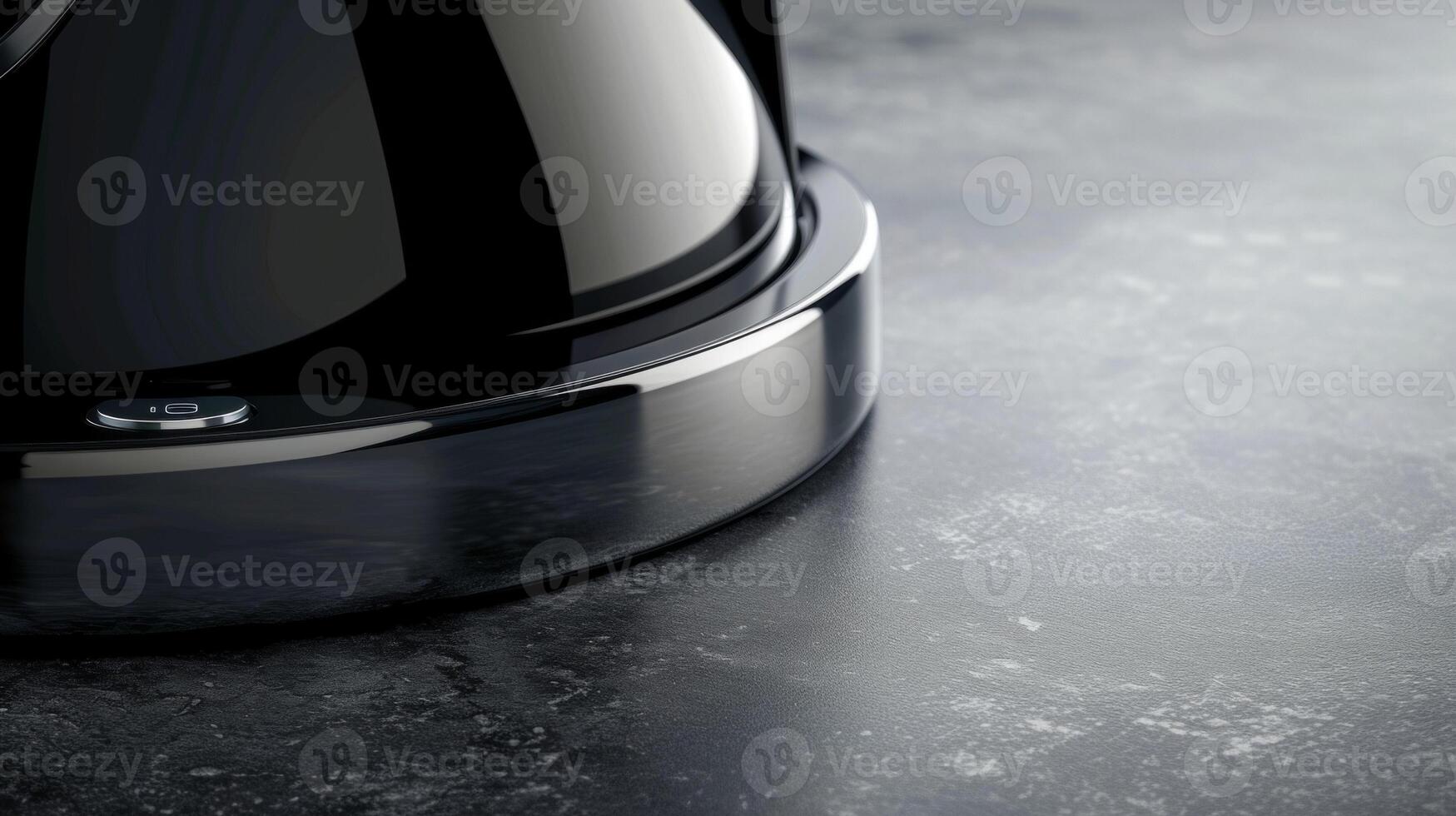 The smooth and sleek power base of an electric kettle with just one button to effortlessly turn it on and off photo