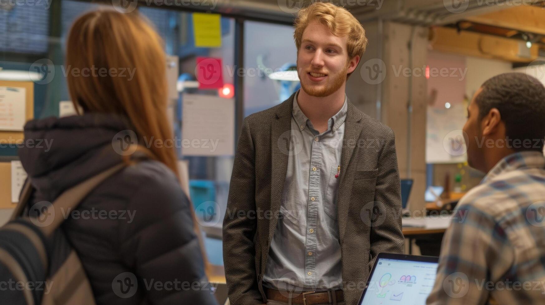 A student proudly showcasing their prototype product to a small group of investors and mentors in the cozy and collaborative setting of a campus startup incubator photo