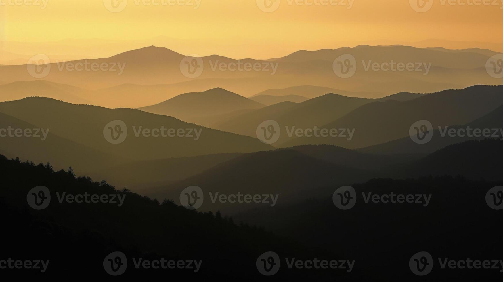 A dusky twilight highlighting the silhouettes of distant ridges photo