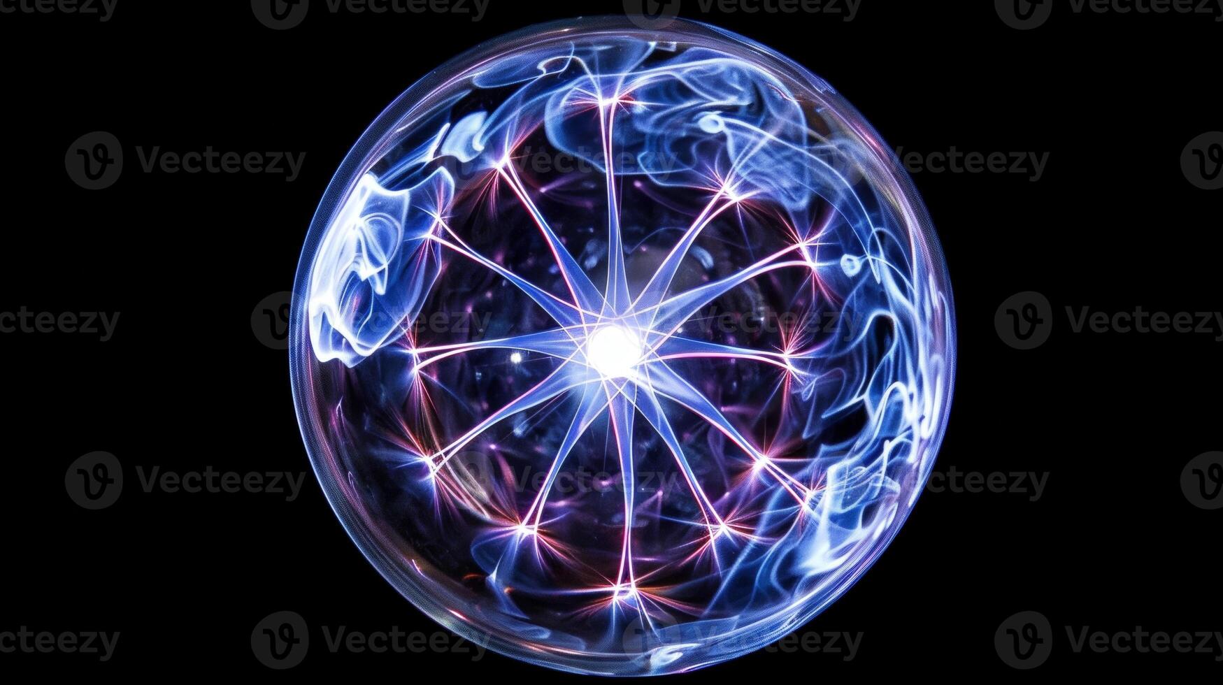 The center of the plasma ball glows with a bright white light radiating outwards photo