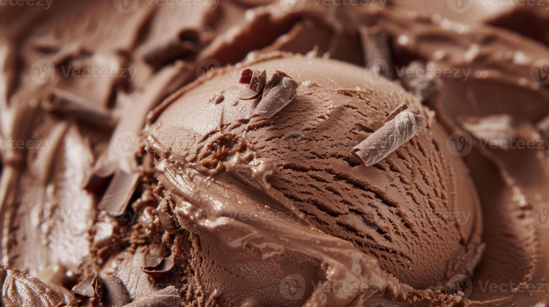 A single scoop of chocolate ice cream nestled in a white bowl, creating a tempting dessert treat photo