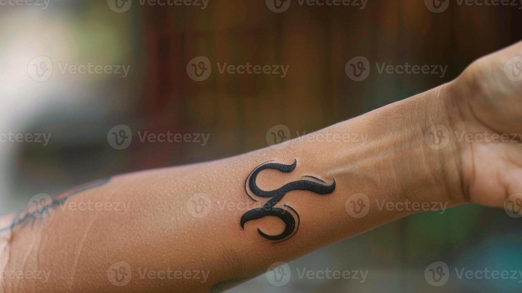The symmetrical lines of s on a persons arm a reminder of the balance and harmony needed to sustain life. photo