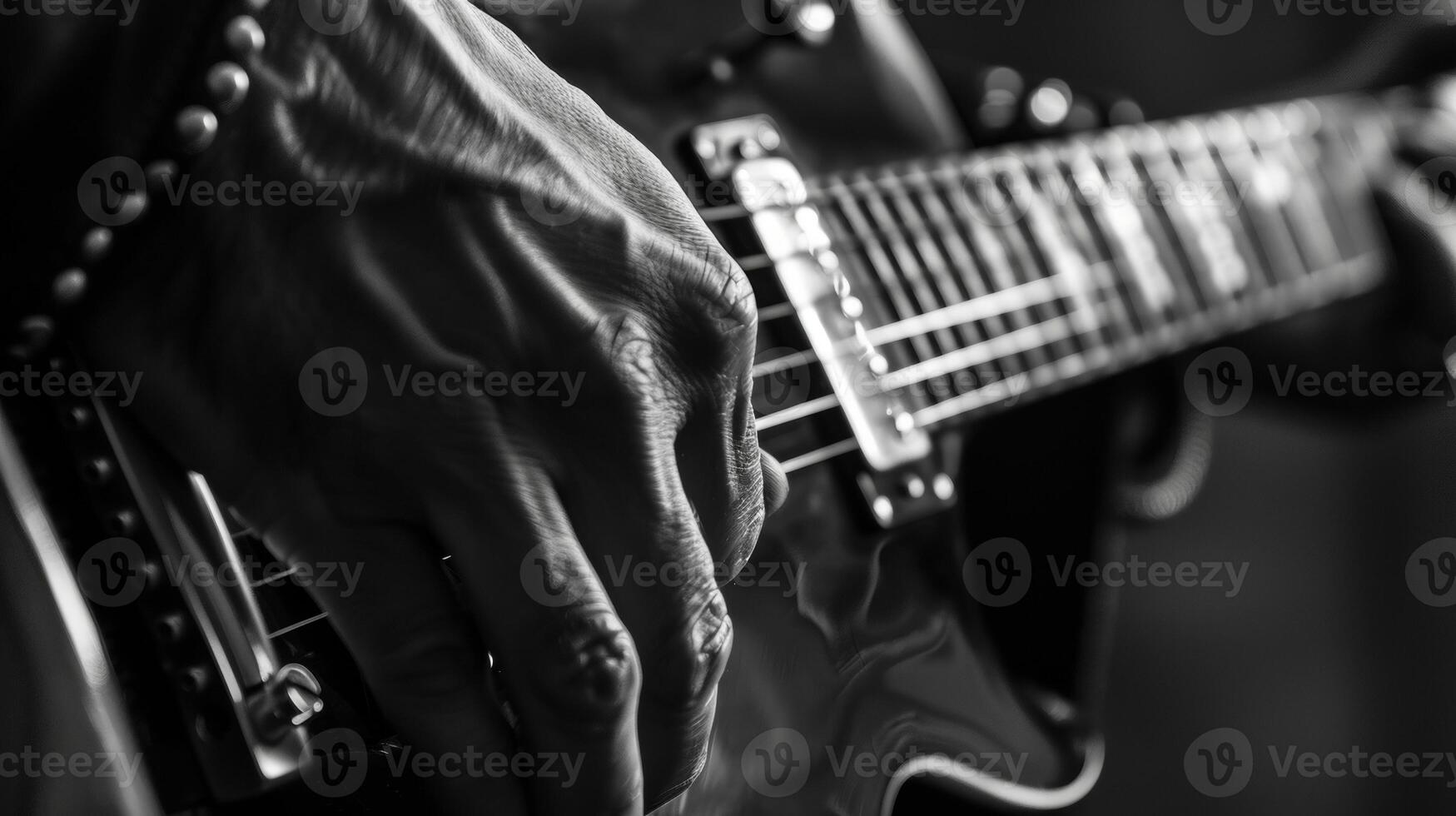 The graceful movements of a guitarists fingers are like a wellchoreographed dance each note carefully p and intentional. photo