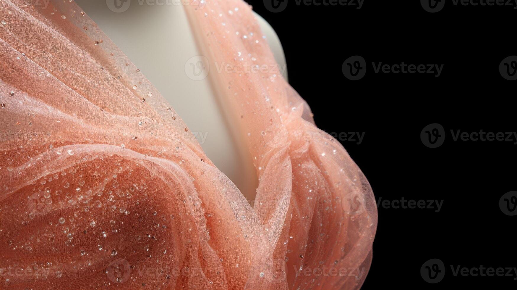 Closeup of a Peach Fuzz tail dress with a shimmery, glossy texture, perfect for a gl evening event. photo