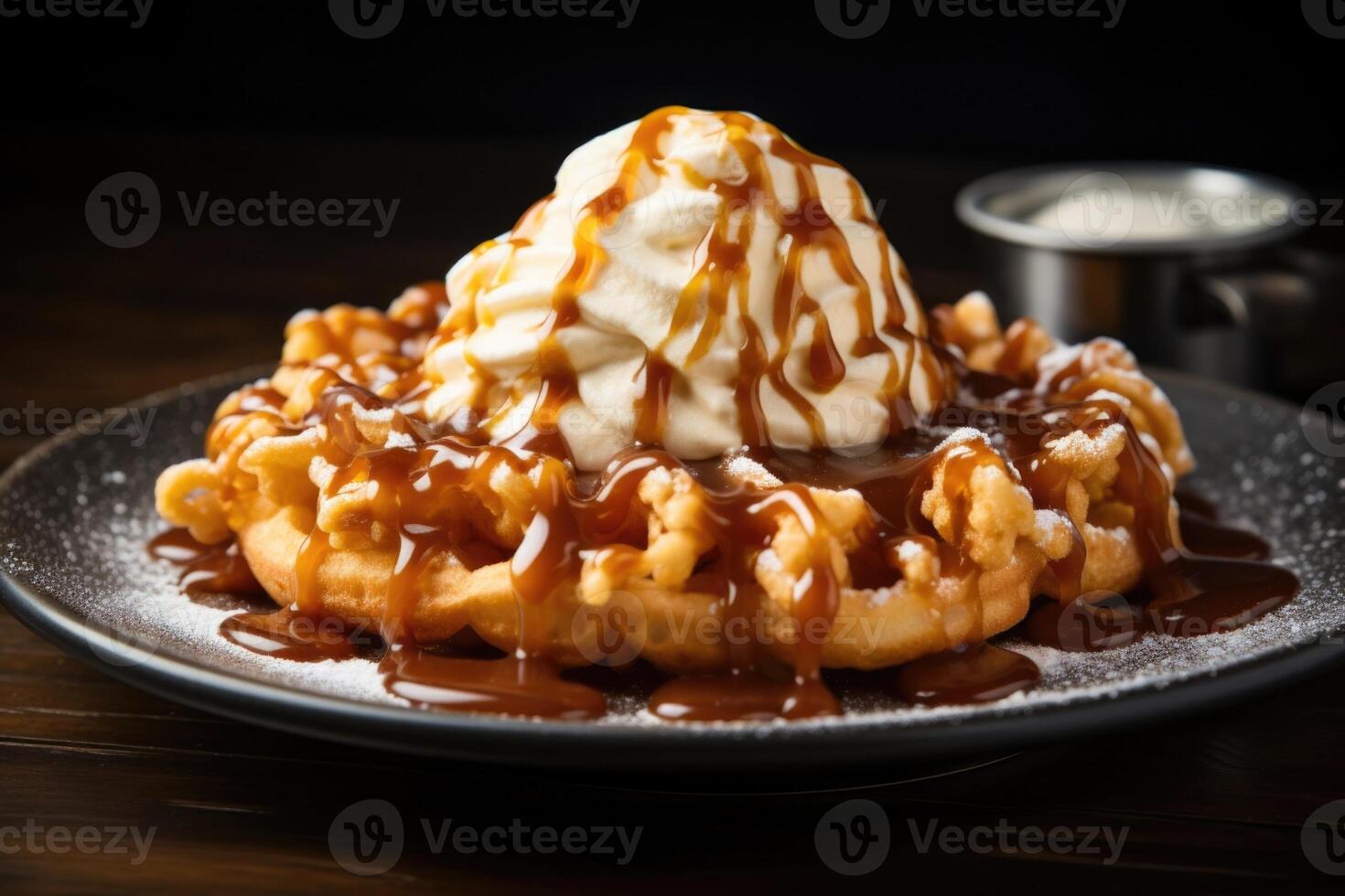 Ready to embrace a burst of sweetness This funnel cake is generously drizzled with a golden caramel sauce, creating a heavenly combination that will satisfy your deepest dessert cravings. photo