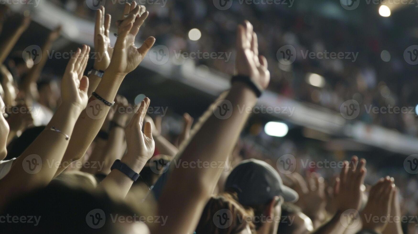 The stands are alive with energy as the crowd erupts into a deafening wave of cheers photo