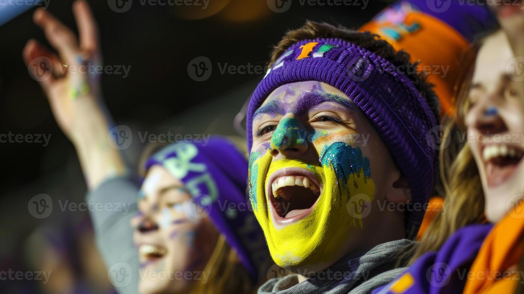 Loud cheers and colorful face paint create a lively atmosphere in the stands photo