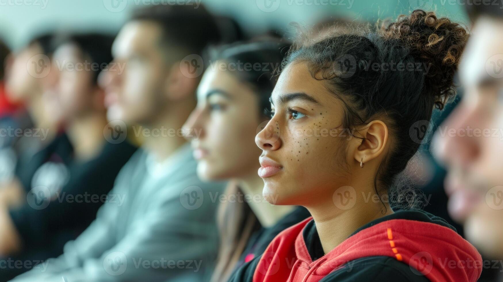 Aspiring athletes attend lectures and workshops at the sports academy learning about the importance of sportsmanship and teamwork in addition to athletic skills photo