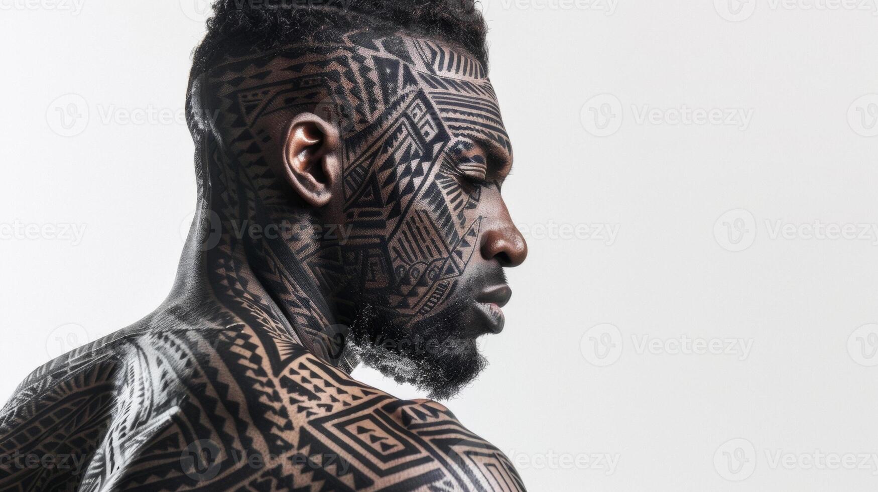 In this portrait a man with intricate geometric tattoos adorning his face and body stands out against a stark white background. The tattoo designs are inspired by traditional tribal photo