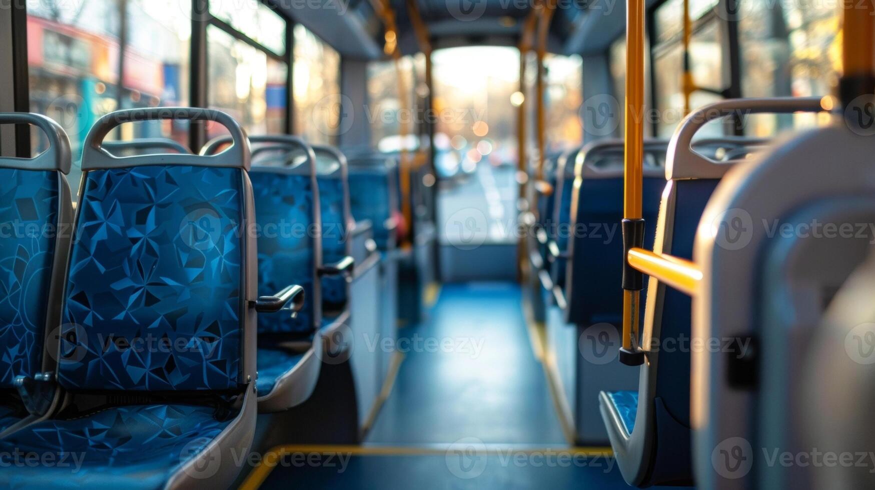 A closeup shot of the inside of a biofuelpowered city bus with rows of comfortable seats and clean spacious aisles. The windows allow natural light to flood in creating a pleasant photo