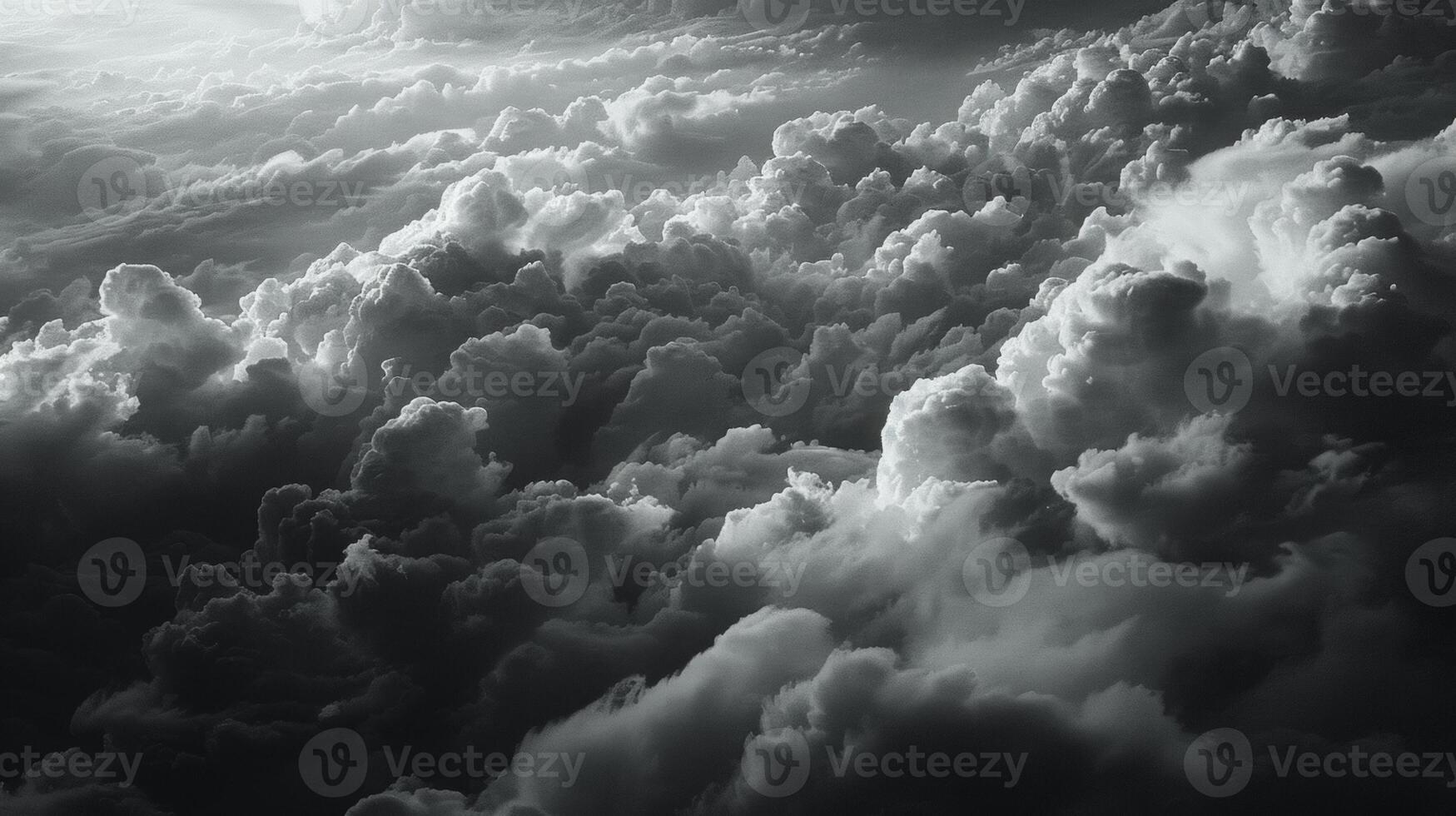 As the day progresses the clouds start to darken and the light shifts to a darker more moody tone. The edges of the clouds become more defined and shadowy giving the impression of photo