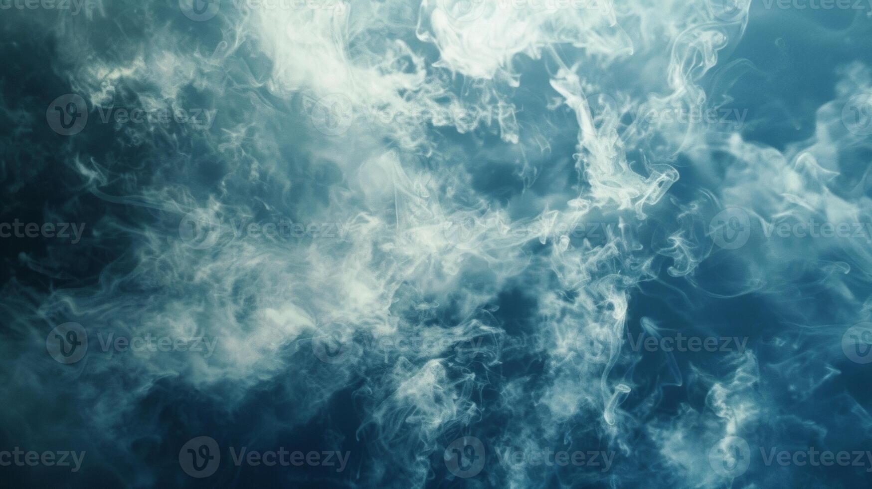 Small clouds of breath mingle and merge creating an intricate dance in the chilly atmosphere. photo