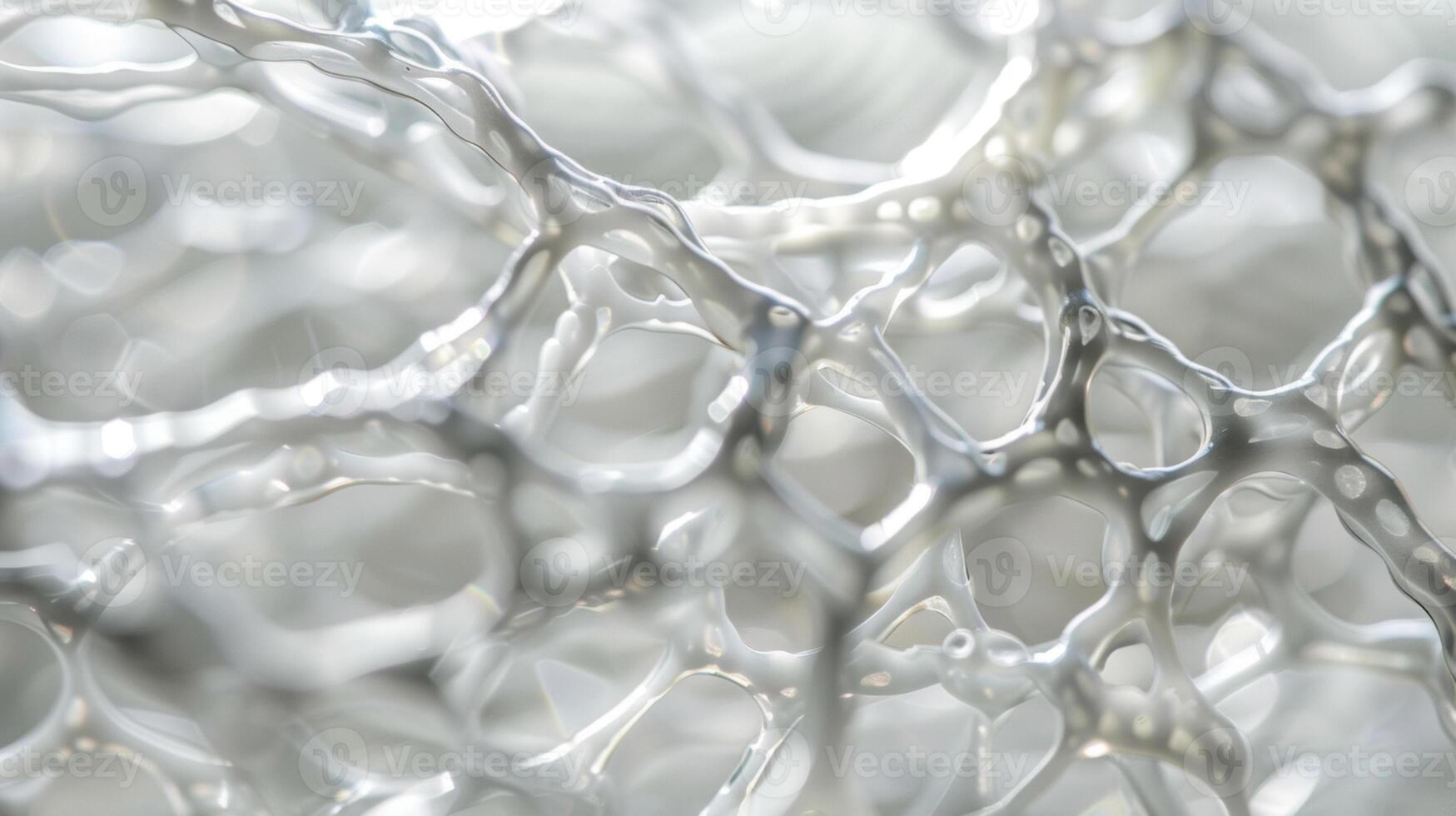 A closeup of a crystalclear membrane with a delicate pattern of cells visible underneath. This biocompatible material is used to create contact lenses providing a comfortabl photo