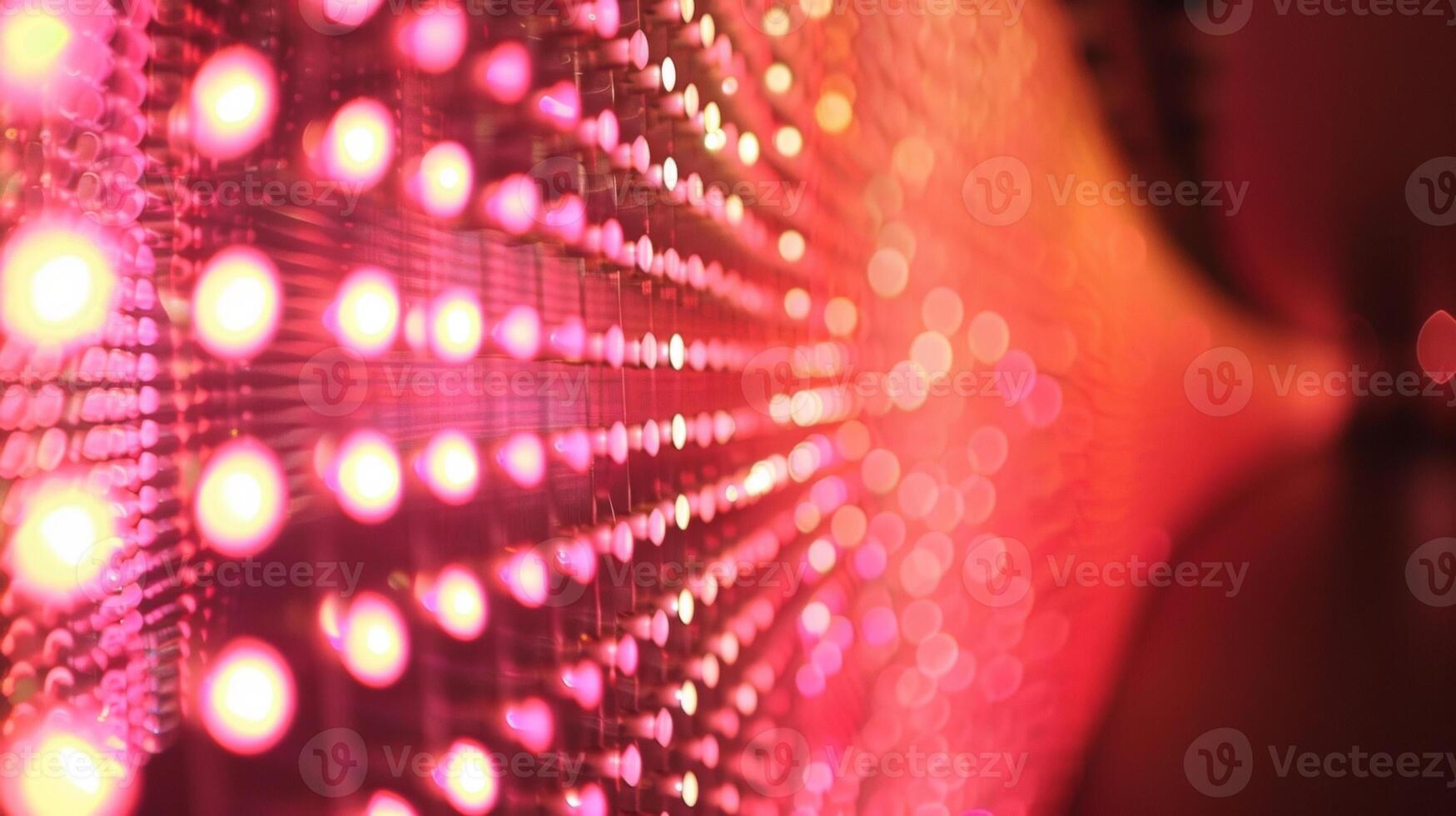A series of blurred lights in motion captured by a long exposure photograph of an experimental light show at a sonic art exhibit photo
