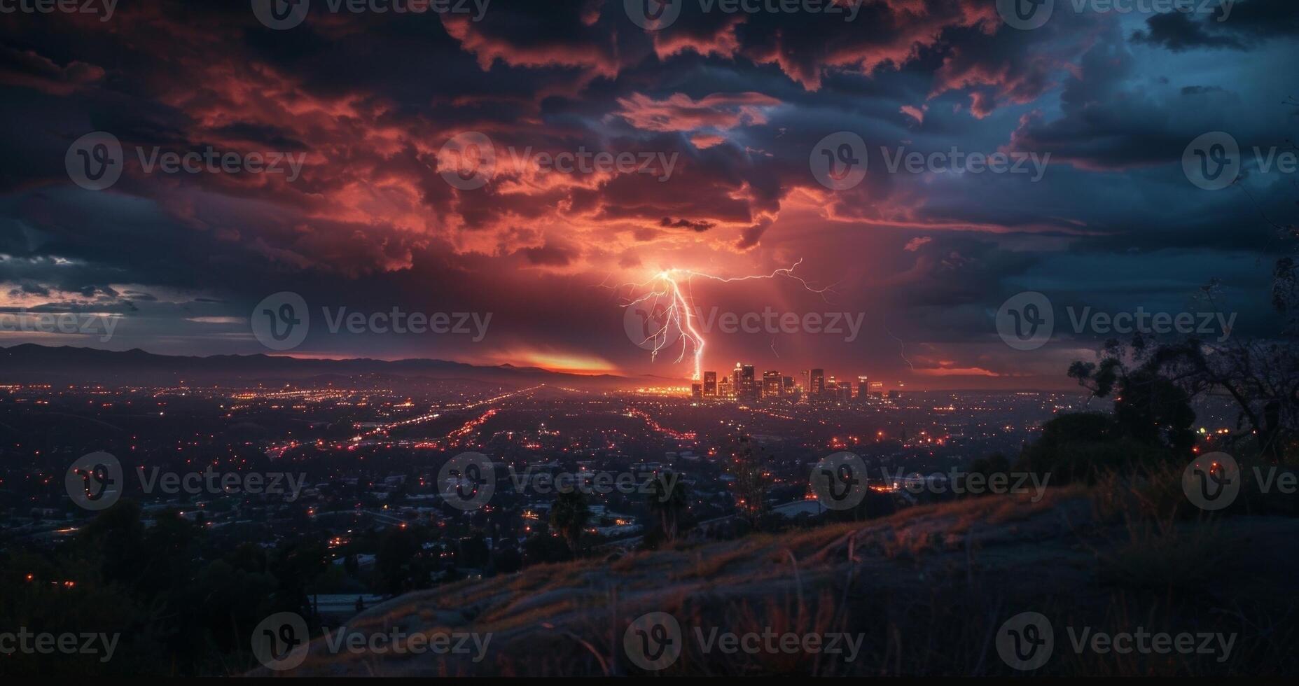 A jagged bolt of lightning dances across the horizon briefly revealing the outline of a distant city photo