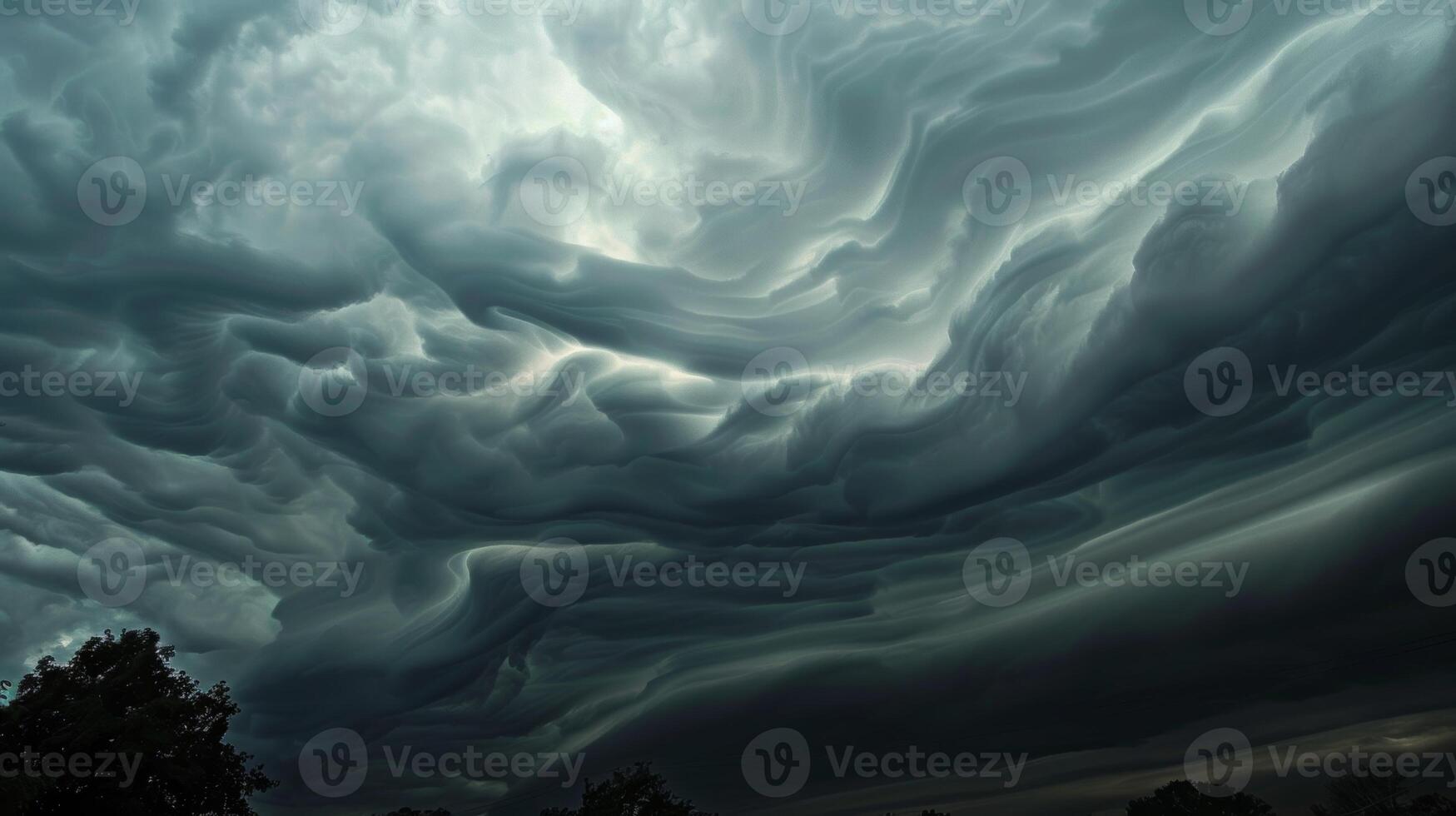 The air is thick and heavy under these unique cloud formations photo