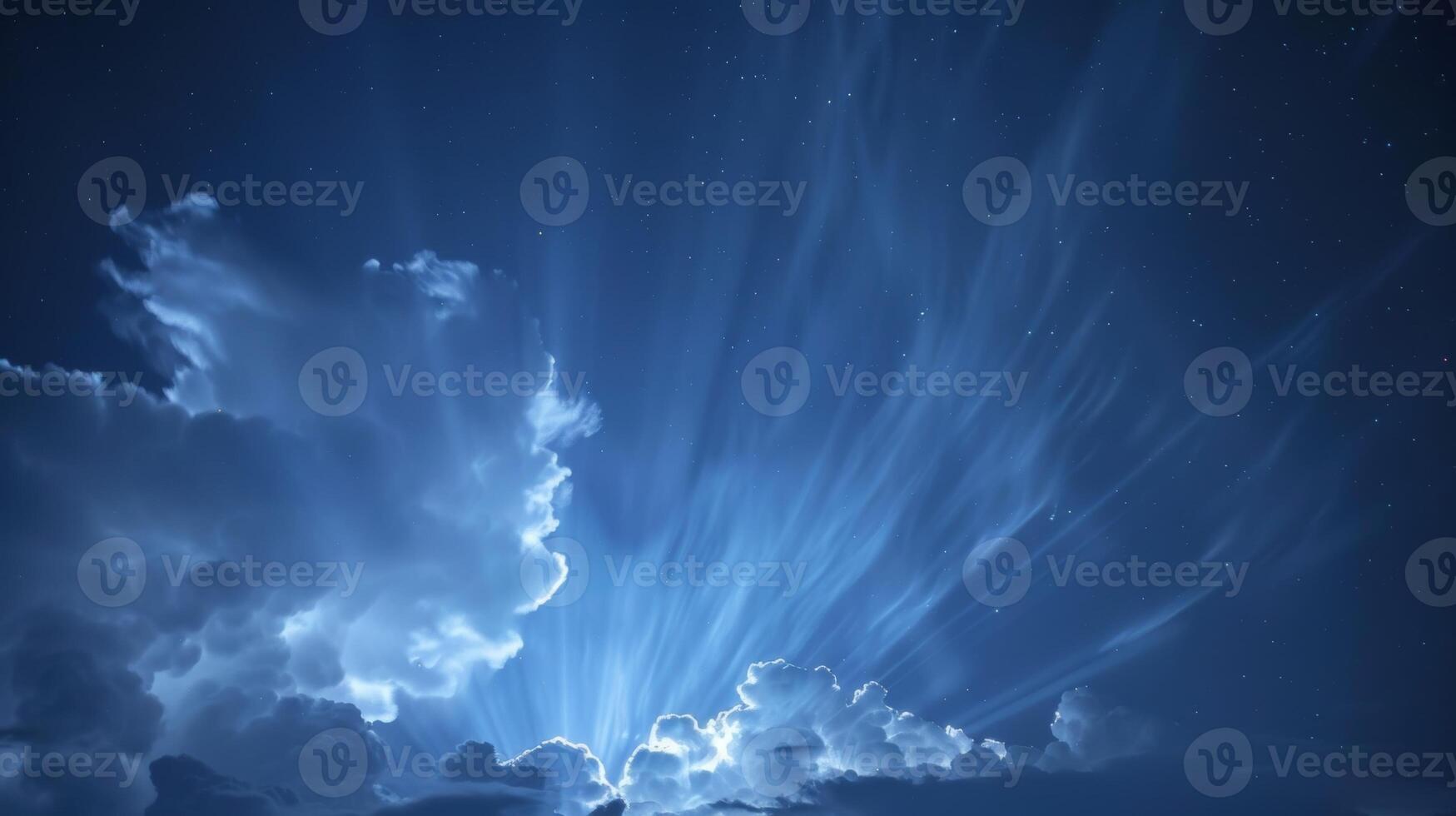 Soft glowing clouds lighting up the night sky creating a striking and rare display for those who witness it photo