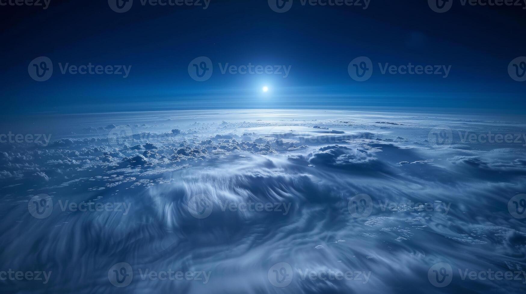 Pristine noctilucent clouds illuminated by the soft light of the moon creating an ethereal atmosphere photo