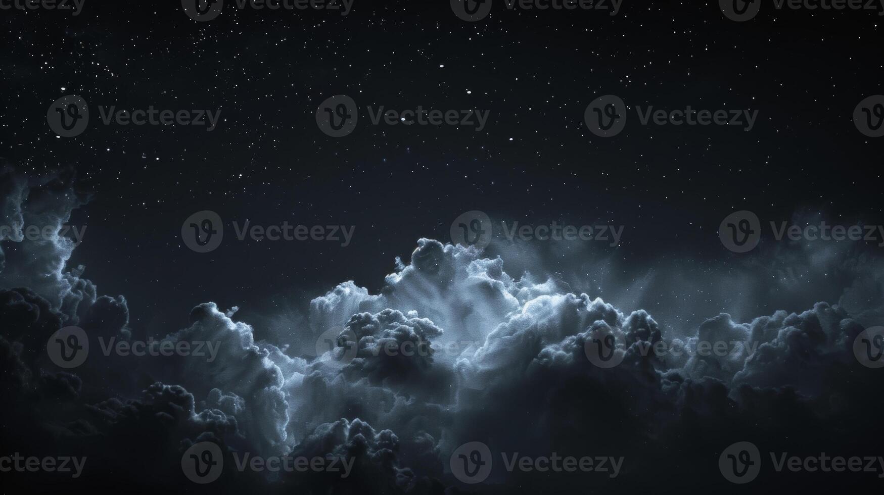 A dark yet captivating scene of the night shining clouds adding an extra layer of mystique to the universe photo