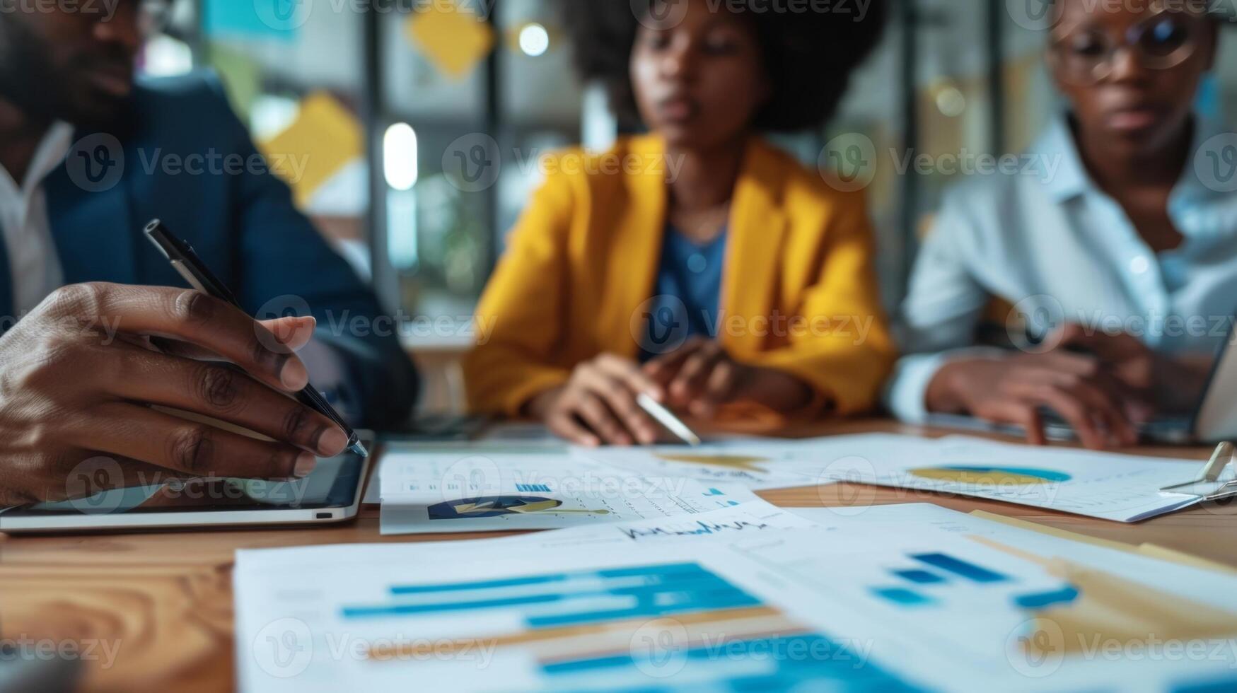 In a government think tank policymakers work collaboratively to analyze complex data sets on crime rates and determine the most effective approaches to reducing crime photo