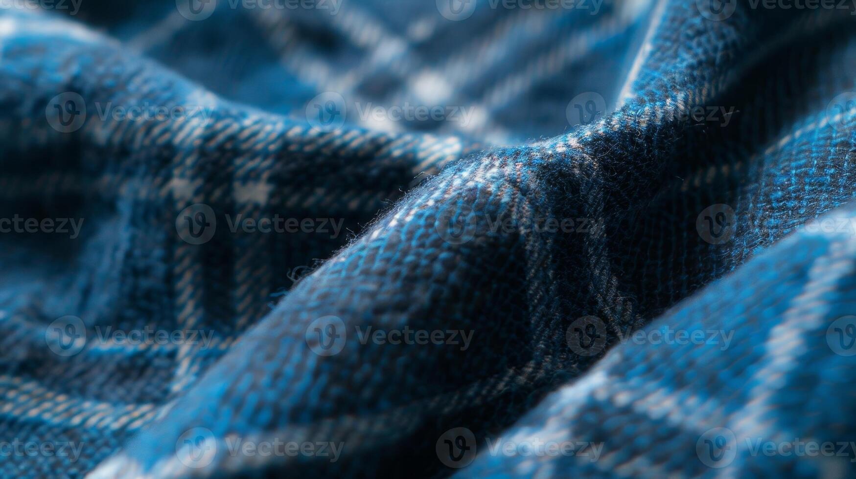 Cotton Blend In this closeup texture image the softness and flexibility of the flannel shirts cotton blend fabric is evident making it a comfortable and versatile garment photo