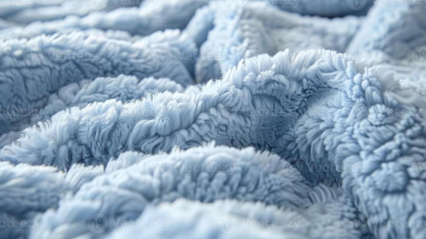 A closeup of a blue sherpa fleece with an alluring fluffy nap that offers softness and comfort photo