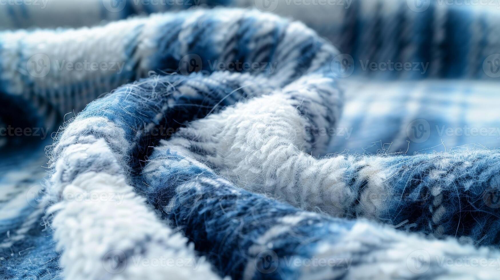 A detailed shot of a blue and white plaid flannelette fabric highlighting its mild fuzziness and smooth surface photo